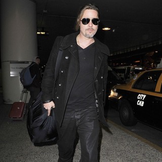 Brad Pitt Arriving at LAX After Flying in from London
