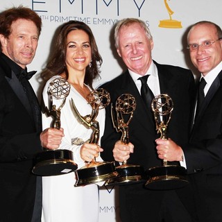 Jerry Bruckheimer, Elise Doganieri, Bertram van Munster, Jonathan Littman in 64th Annual Primetime Emmy Awards - Press Room