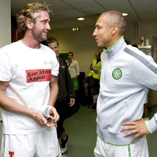 Gerard Butler, Henrik Larsson in The John Kennedy Testimonial Match Between Celtic and Manchester United