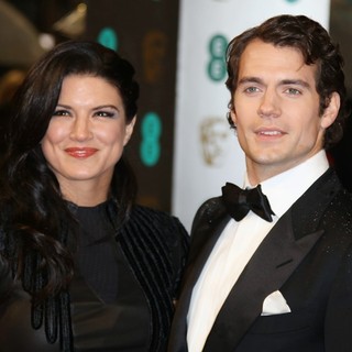 Gina Carano, Henry Cavill in The 2013 EE British Academy Film Awards - Arrivals