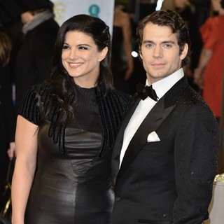 Gina Carano, Henry Cavill in The 2013 EE British Academy Film Awards - Arrivals