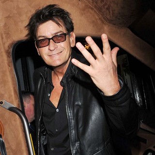 Charlie Sheen in Good Spirits as He Boards His Bus After Leaving The Olympia Theatre