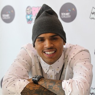 Chris Brown in Chris Brown and Ron English Launches The Dum English Astronaut Collection