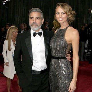 George Clooney, Stacy Keibler in The 85th Annual Oscars - Red Carpet Arrivals