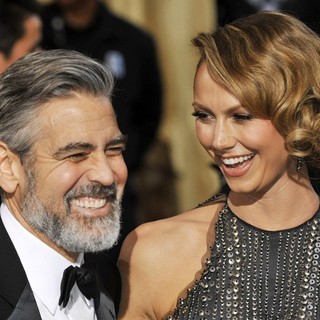 George Clooney, Stacy Keibler in The 85th Annual Oscars - Red Carpet Arrivals