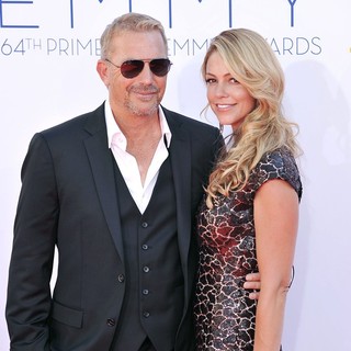 Kevin Costner, Christine Baumgartner in 64th Annual Primetime Emmy Awards - Arrivals