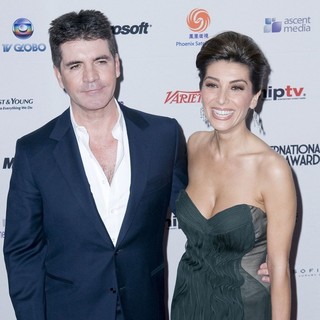 Simon Cowell, Mezhgan Hussainy in 38th International EMMY Awards - Arrivals