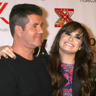 Demi Lovato in The X Factor 2012 Final Four Party - cowell-lovato-the-x-factor-2012-final-four-party-01