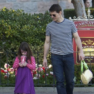 Suri Cruise, Tom Cruise in Tom Cruise and Suri Cruise Spend An Afternoon at Disneyland