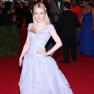 Dakota Fanning in Schiaparelli and Prada Impossible Conversations Costume Institute Gala
