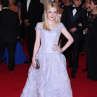 Dakota Fanning in Schiaparelli and Prada Impossible Conversations Costume Institute Gala