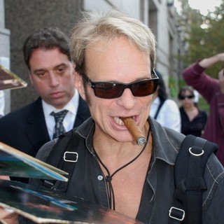 David Lee Roth in David Lee Roth Signs Autographs as He Leaves His Hotel in Philadelphia