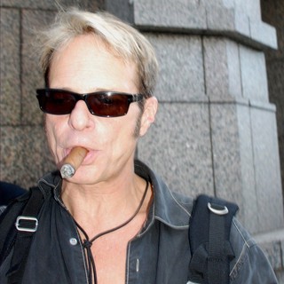 David Lee Roth in David Lee Roth Signs Autographs as He Leaves His Hotel in Philadelphia