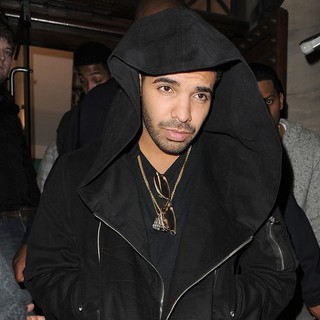 Drake in Drake Leaving Aura Nightclub