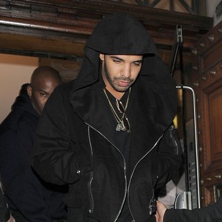Drake in Drake Leaving Aura Nightclub