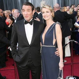 Jean Dujardin, Alexandra Lamy in 84th Annual Academy Awards - Arrivals