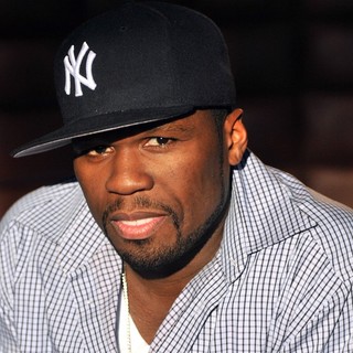 50 Cent in 50 Cent Signs Copies of his SMS Audio Designed Headphones