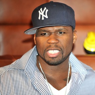 50 Cent in 50 Cent Signs Copies of his SMS Audio Designed Headphones