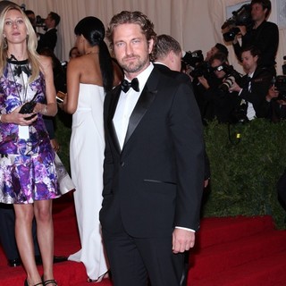 Gerard Butler in Schiaparelli and Prada Impossible Conversations Costume Institute Gala