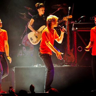 Chris Colfer, Chord Overstreet, Mark Salling in The Cast of Glee Live in Concert Performing on Stage
