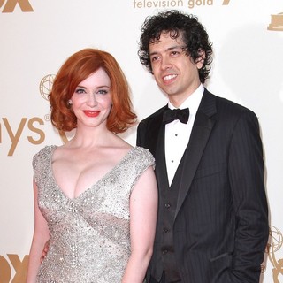 Christina Hendricks, Geoffrey Arend in The 63rd Primetime Emmy Awards - Arrivals