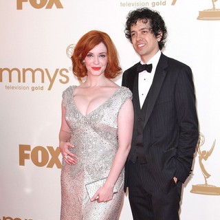Christina Hendricks, Geoffrey Arend in The 63rd Primetime Emmy Awards - Arrivals