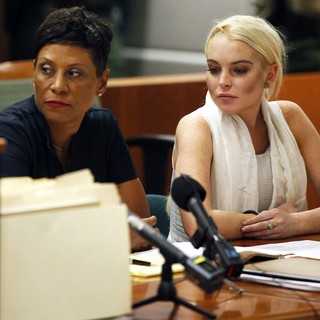Shawn Chapman Holley, Lindsay Lohan in Lindsay Lohan Before Being Escorted from The Courtroom in Handcuffs