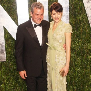 Danny Huston, Olga Kurylenko in 2012 Vanity Fair Oscar Party - Arrivals
