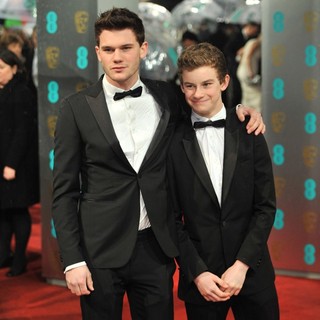 Jeremy Irvine, Toby Irvine in The 2013 EE British Academy Film Awards - Arrivals