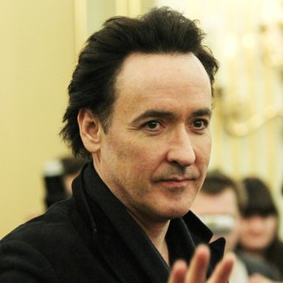 John Cusack in The Russian Press Conference for Film The Raven
