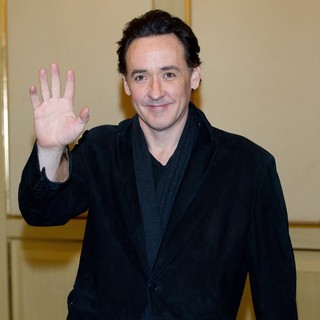 John Cusack in The Russian Press Conference for Film The Raven