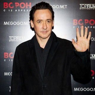 John Cusack in The Russian Press Conference for Film The Raven