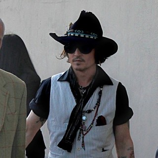 Johnny Depp in Johnny Depp Sign Autographs Outside The El Capitan Theatre