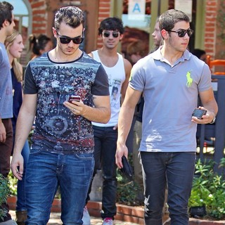Jonas Brothers Seen Exiting A Restaurant