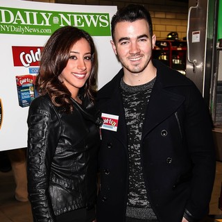 Danielle Deleasa, Kevin Jonas in Kevin Jonas and Danielle Deleasa Host A FDNY Food Drive for Hurricane Sandy Victims