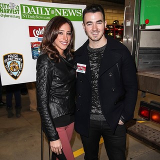 Danielle Deleasa, Kevin Jonas in Kevin Jonas and Danielle Deleasa Host A FDNY Food Drive for Hurricane Sandy Victims