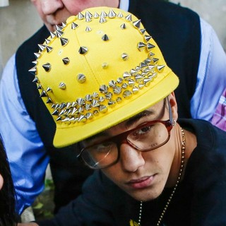 Justin Bieber in Justin Bieber Departs His Hotel Wearing A Yellow Studded Baseball Hat