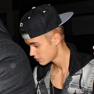 Justin Bieber in Justin Bieber Left His Hotel at 1AM and Headed for Two Clubs Heavily Protected by His Security