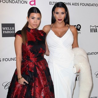 Kourtney Kardashian, Kim Kardashian in 21st Annual Elton John AIDS Foundation's Oscar Viewing Party