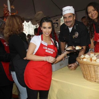 Kim Kardashian, Charlie Beck in 75th Anniversary of The Los Angeles Mission Serving Thanksgiving Dinner to The Homeless