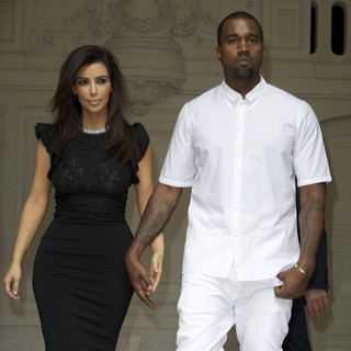 Kim Kardashian, Kanye West in Paris Fashion Week Fall-Winter 2013 - Valentino - Departures