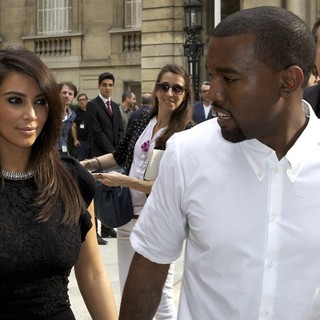 Kim Kardashian, Kanye West in Paris Fashion Week Fall-Winter 2013 - Valentino - Departures