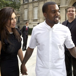 Kim Kardashian, Kanye West in Paris Fashion Week Fall-Winter 2013 - Valentino - Departures