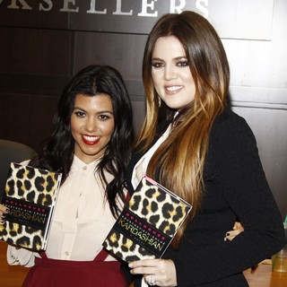 Kourtney Kardashian, Khloe Kardashian in Khloe Kardashian and Kourtney Kardashian Sign Copies of Their New Book Dollhouse