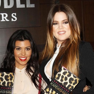 Kourtney Kardashian, Khloe Kardashian in Khloe Kardashian and Kourtney Kardashian Sign Copies of Their New Book Dollhouse
