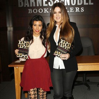 Kourtney Kardashian, Khloe Kardashian in Khloe Kardashian and Kourtney Kardashian Sign Copies of Their New Book Dollhouse