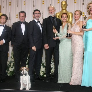 Thomas Langmann, Jean Dujardin, Michel Hazanavicius, James Cromwell, Berenice Bejo, Penelope Ann Miller, Missi Pyle in 84th Annual Academy Awards - Press Room