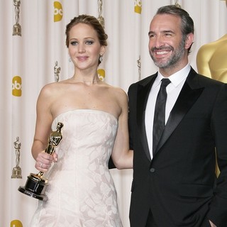 Jennifer Lawrence, Jean Dujardin in The 85th Annual Oscars - Press Room