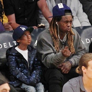 Lil Wayne at The Los Angeles Lakers Game with His Son