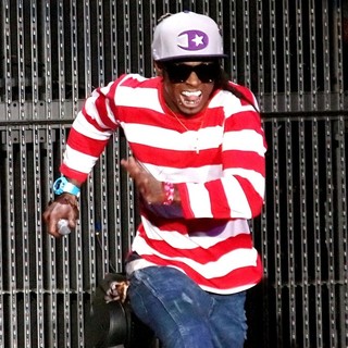 Lil Wayne in Lil Wayne Performs on Stage During The I Am Music Tour